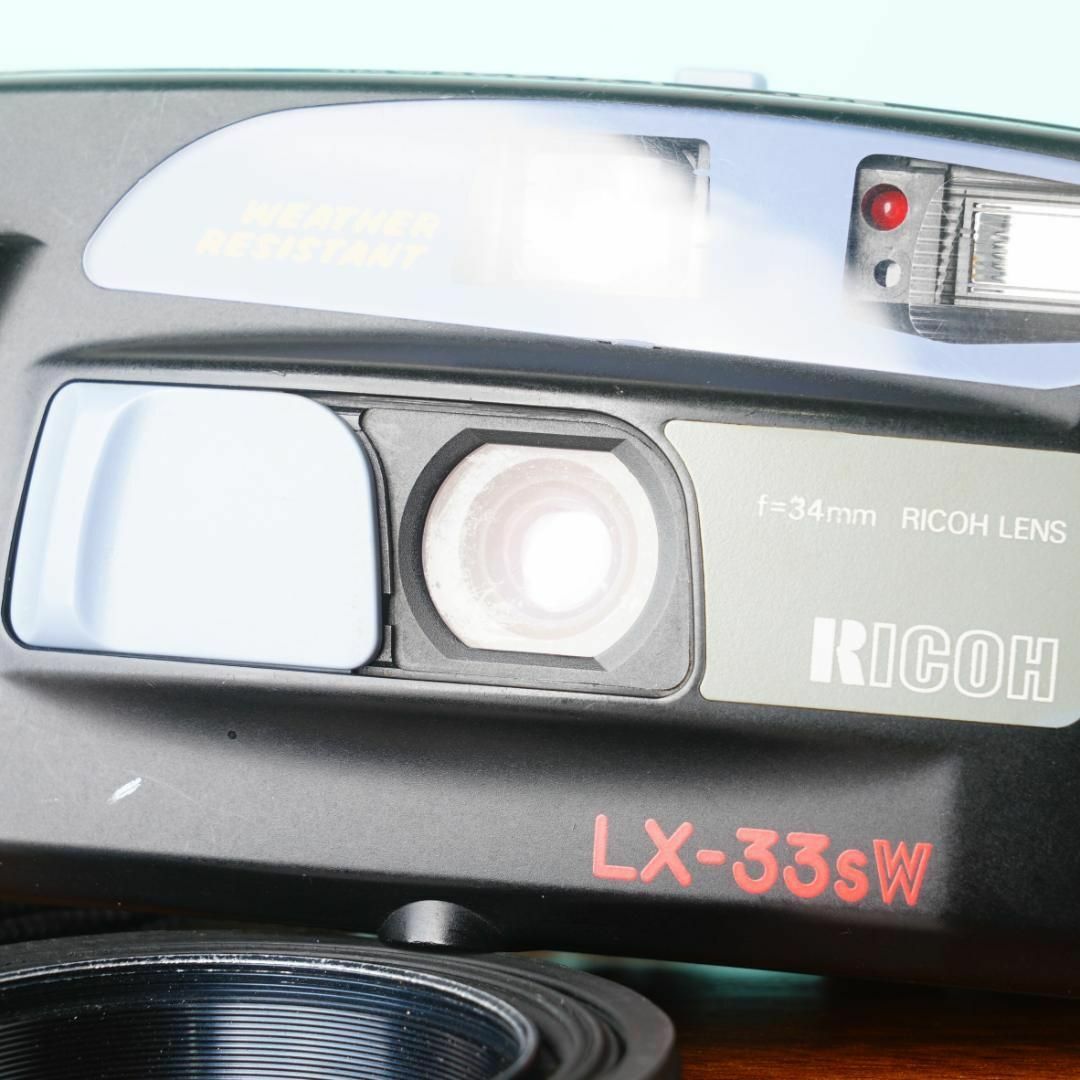 Ricoh LX-33sW 34mm F4.5 - Filem.sg