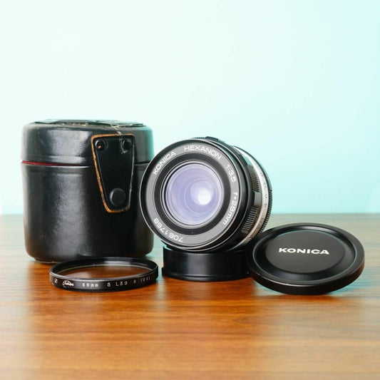 Konica Hexanon 28mm f3.5 AR with case - Filem.sg