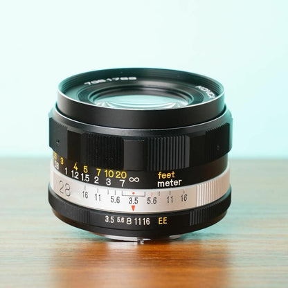 Konica Hexanon 28mm f3.5 AR with case - Filem.sg