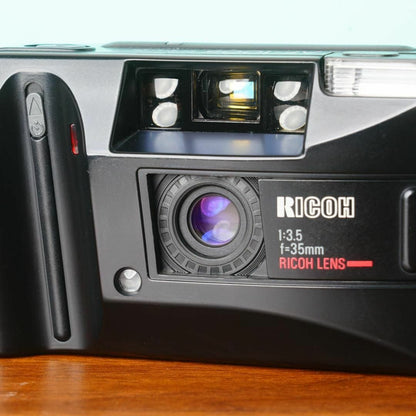 Ricoh AF-100D - Filem.sg