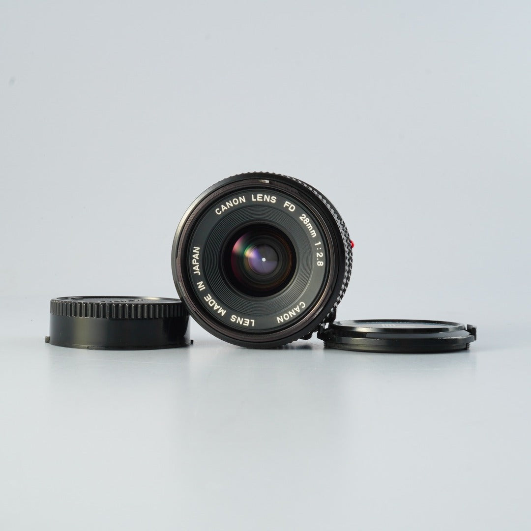 Canon New FD NFD 28mm f2.8 - Filem.sg