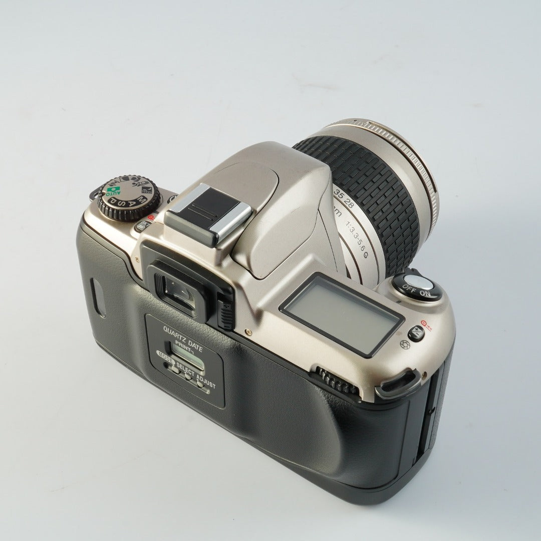 Nikon U N65QD + AF Nikkor 28-80mm f3.3-5.6 G - Filem.sg