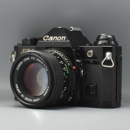 Canon AE-1 Program (Black) with 3 NFD lenses - Filem.sg