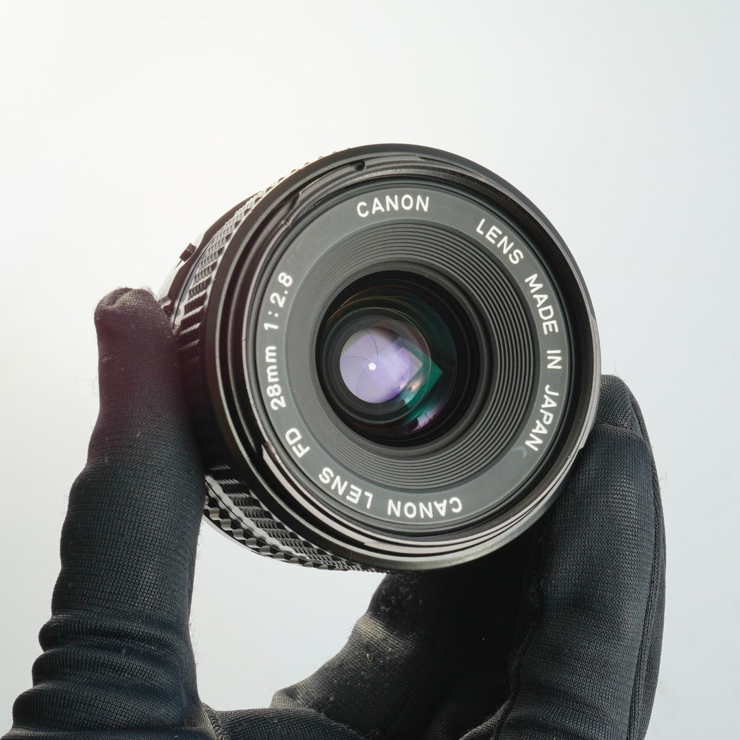 Canon New FD NFD 28mm f2.8 - Filem.sg