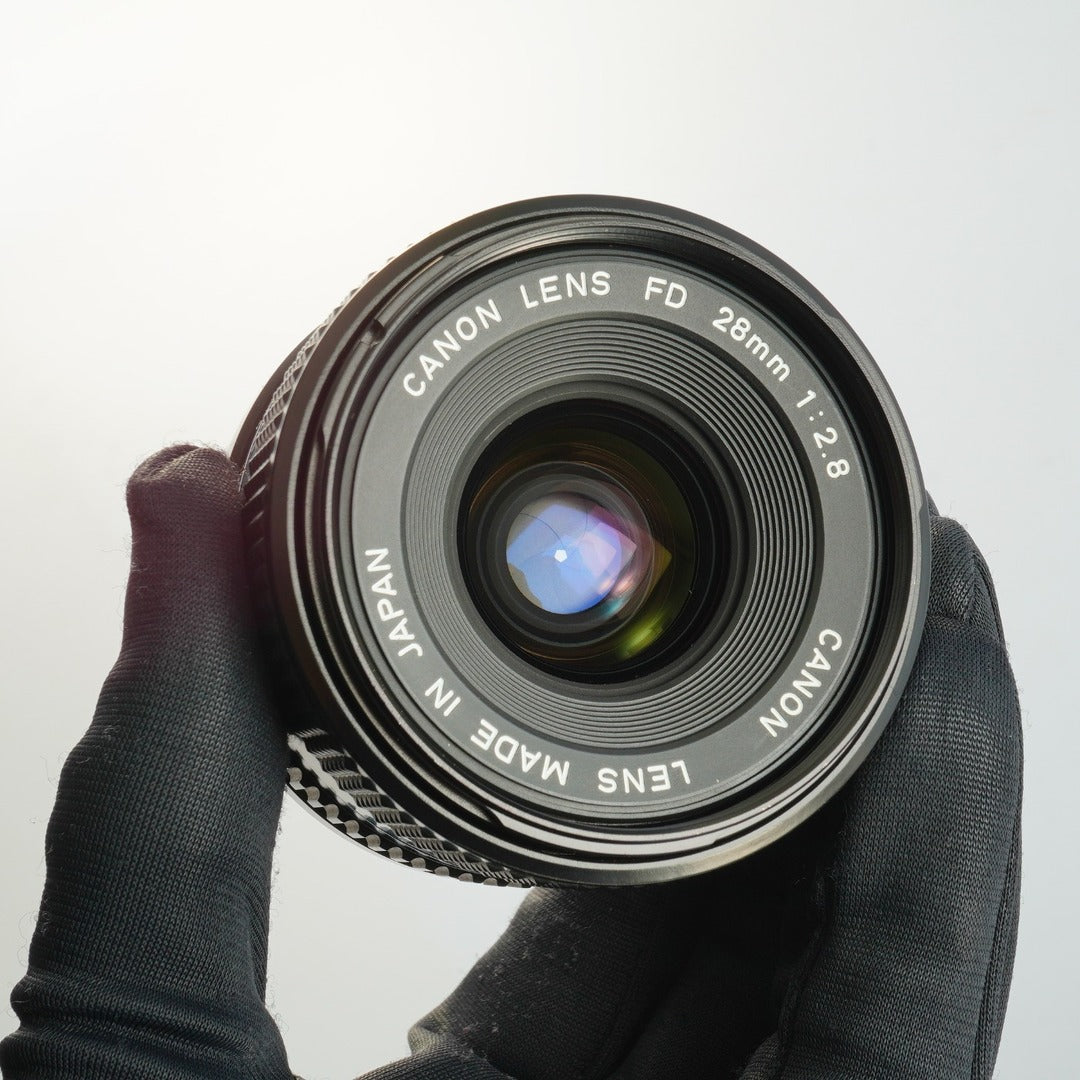Canon New FD NFD 28mm f2.8 - Filem.sg
