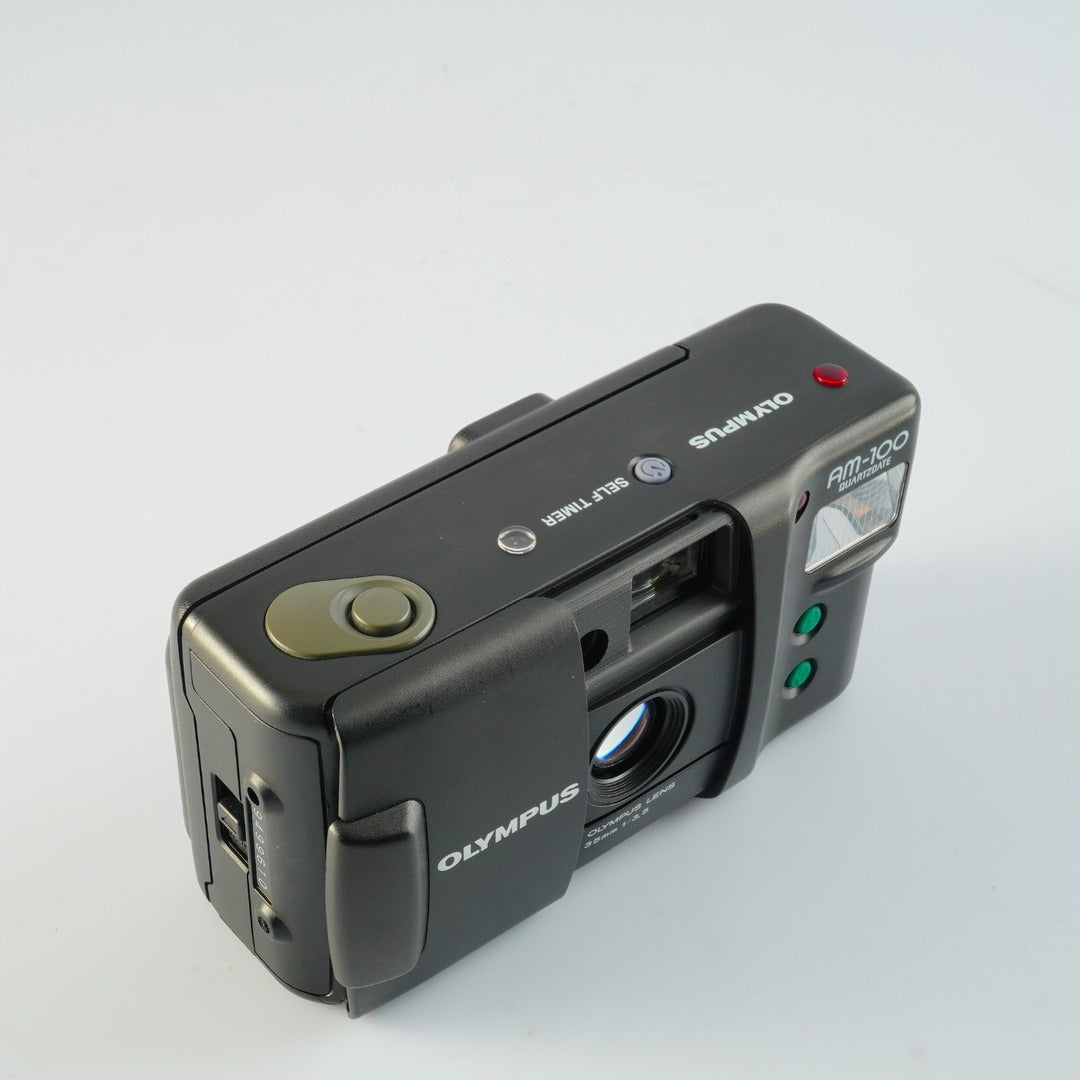 Olympus AM-100 QUARTZDATE 35mm f3.5 - Filem.sg