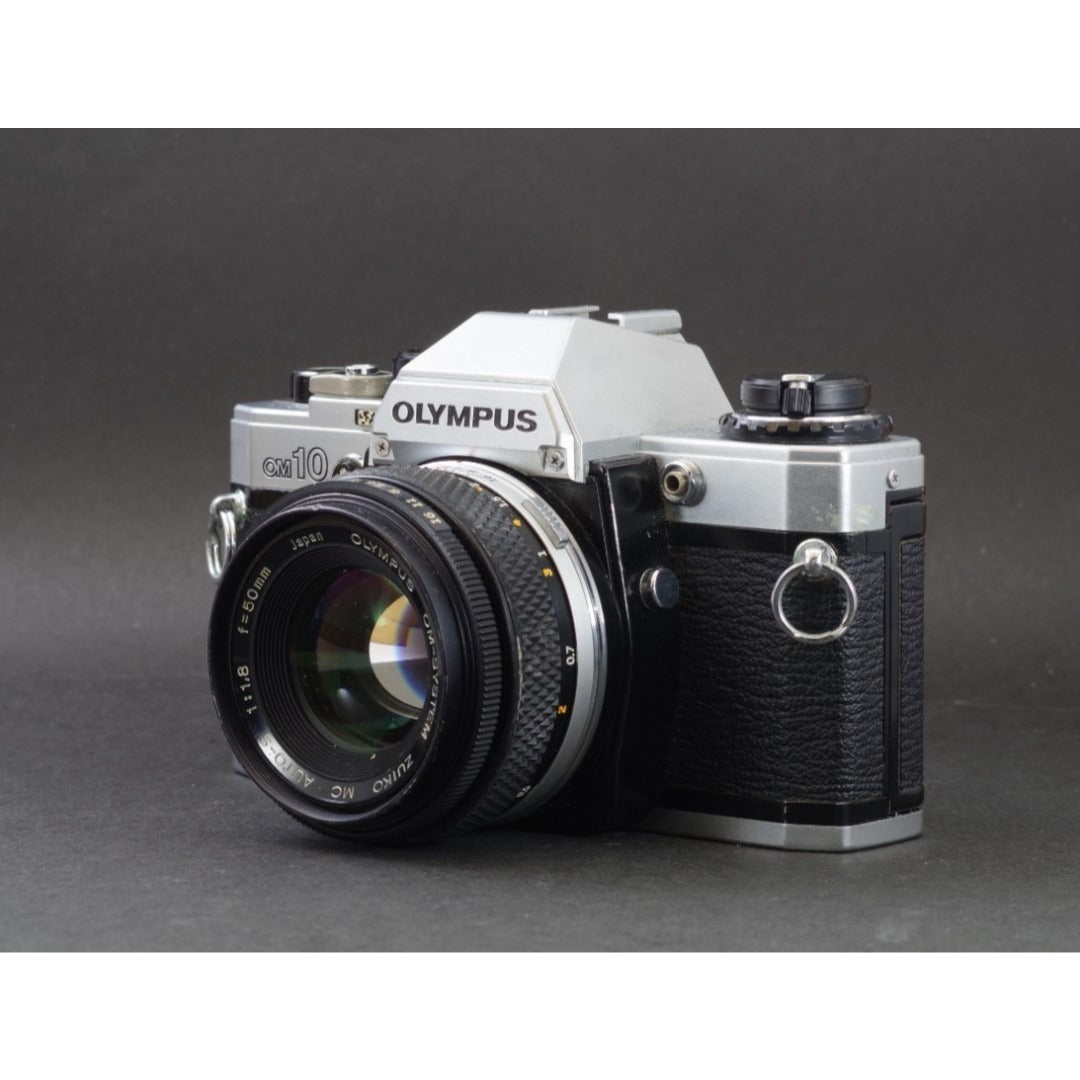 Olympus OM-10 with Zuiko MC Auto-S 50mm f/1.8 - Filem.sg