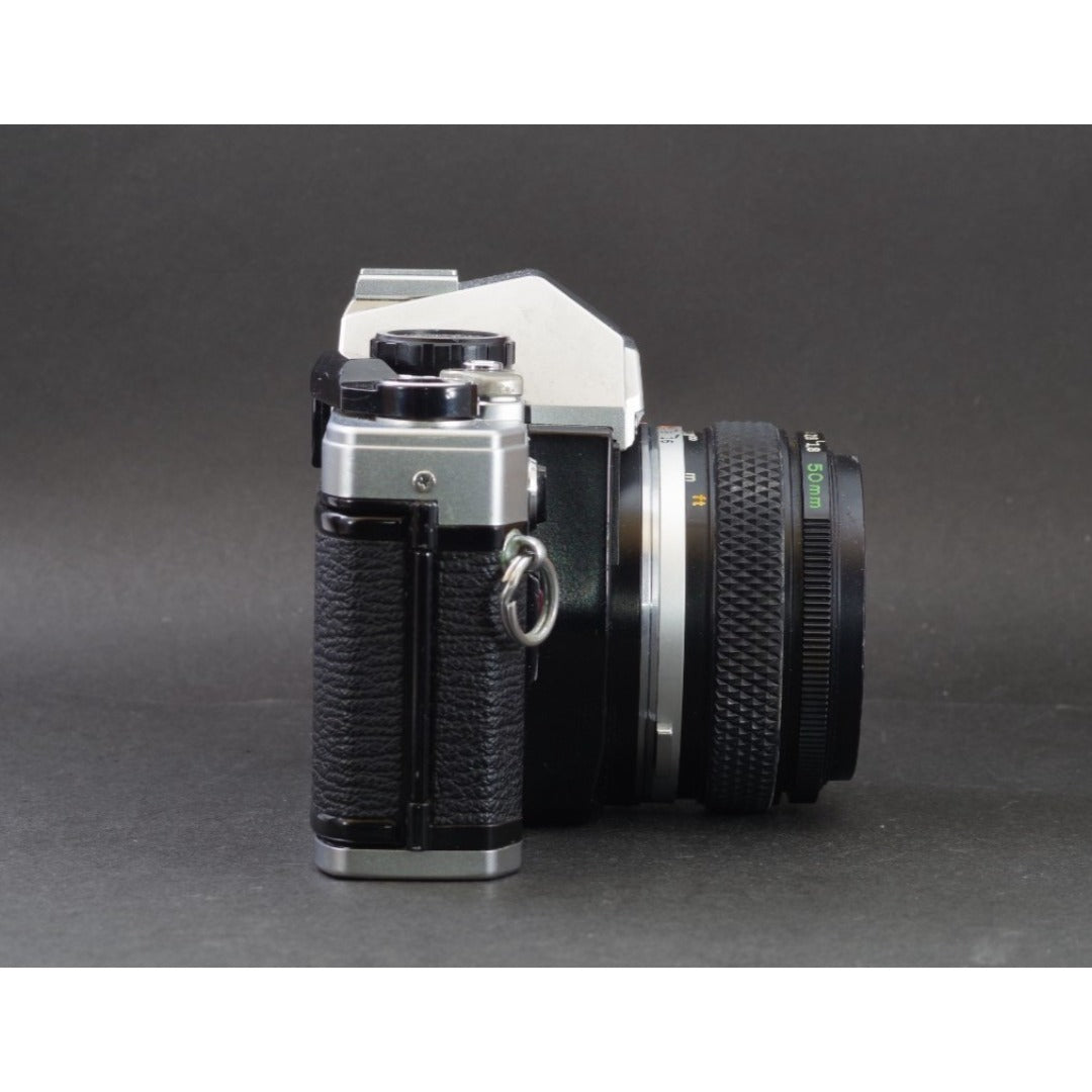 Olympus OM-10 with Zuiko MC Auto-S 50mm f/1.8 - Filem.sg