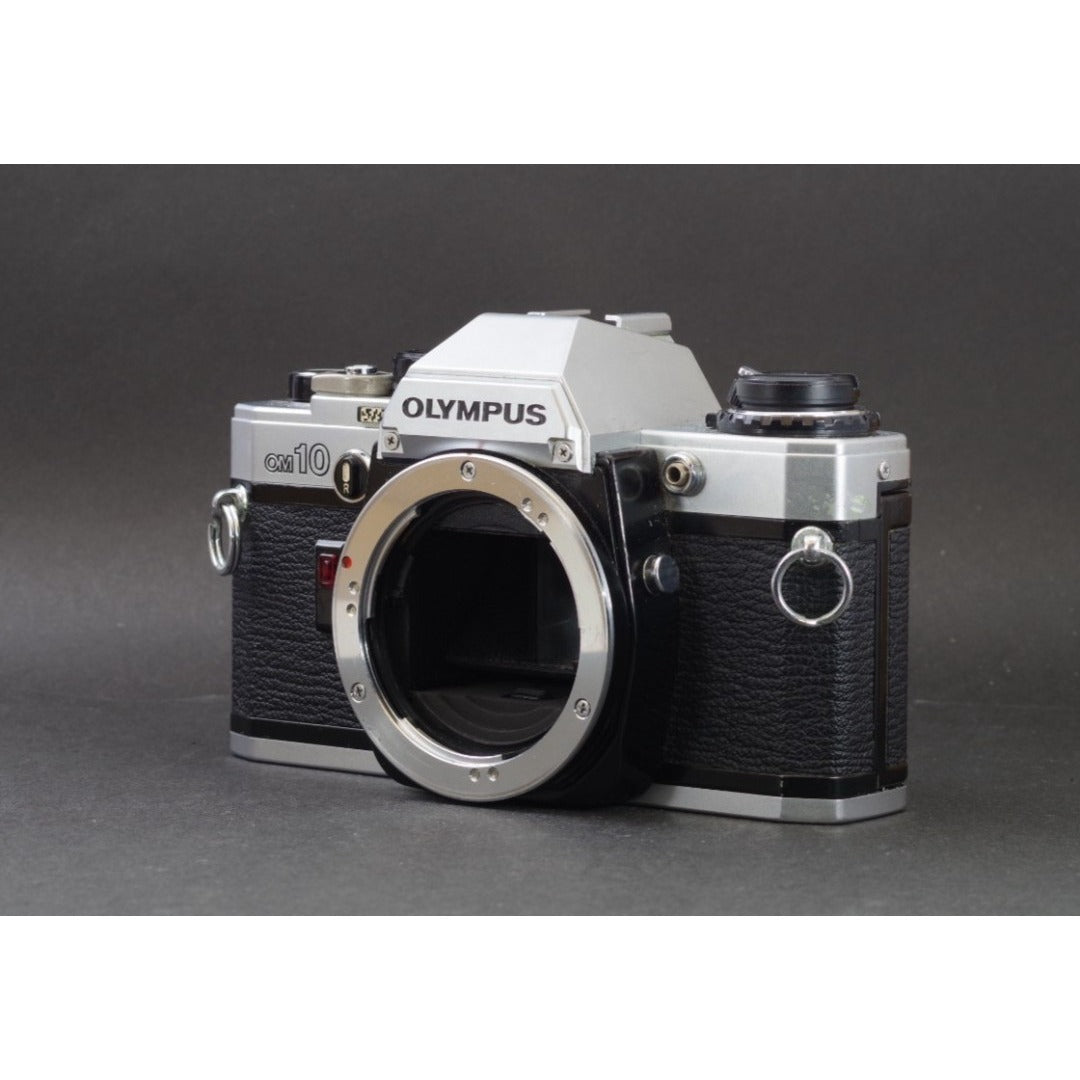 Olympus OM-10 with Zuiko MC Auto-S 50mm f/1.8 - Filem.sg