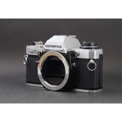 Olympus OM-10 with Zuiko MC Auto-S 50mm f/1.8 - Filem.sg