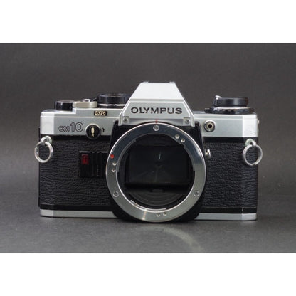 Olympus OM-10 with Zuiko MC Auto-S 50mm f/1.8 - Filem.sg