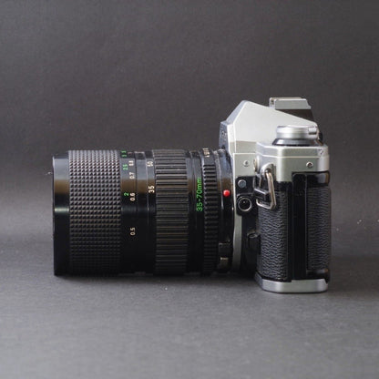 Canon AE-1 with New FD 35-70mm f/4 - Filem.sg