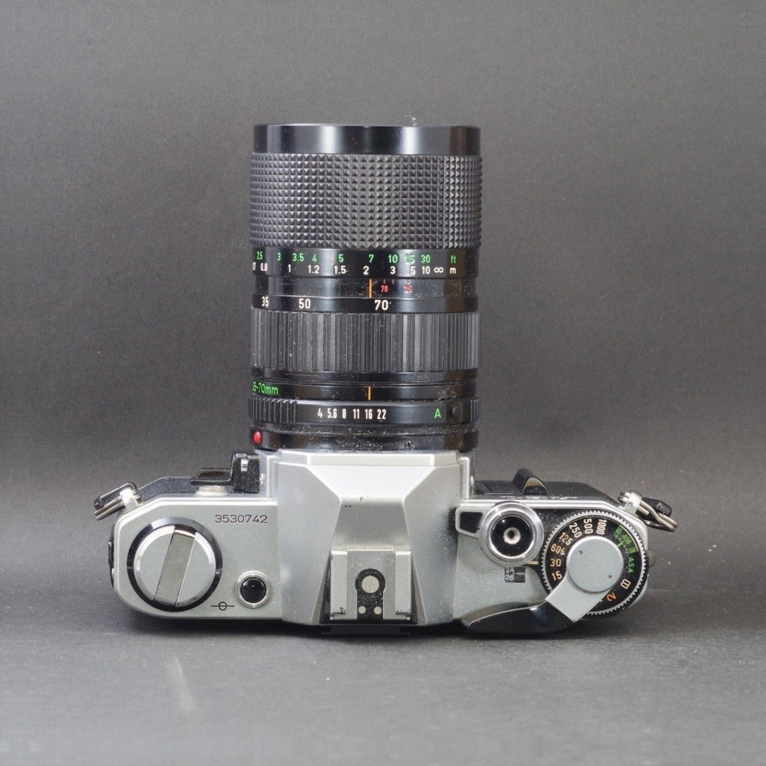Canon AE-1 with New FD 35-70mm f/4 - Filem.sg