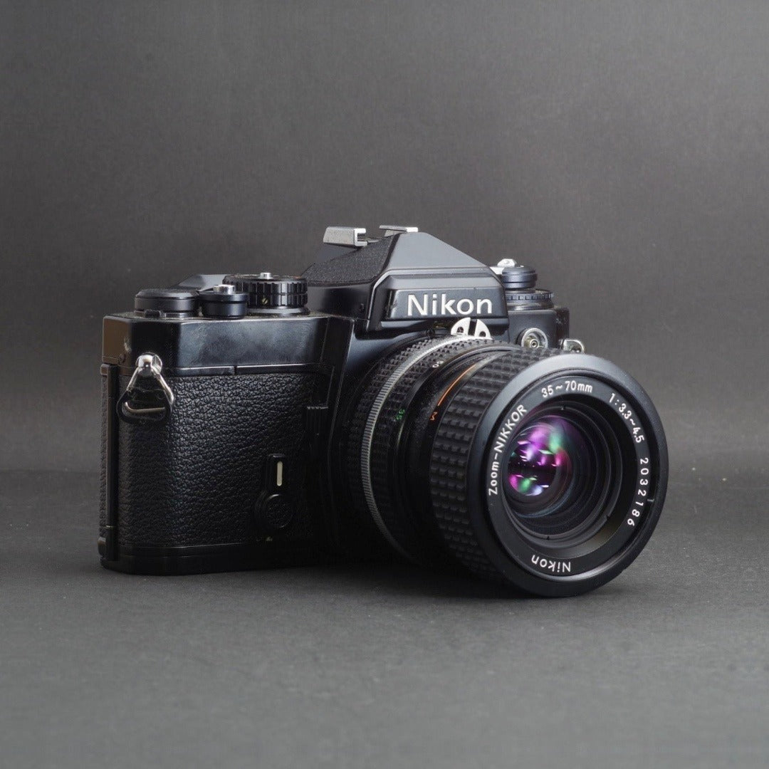 Nikon FE with Zoom-NIKKOR 35-70mm f/3.3-4.5 (Black) - Filem.sg