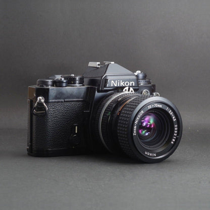 Nikon FE with Zoom-NIKKOR 35-70mm f/3.3-4.5 (Black) - Filem.sg