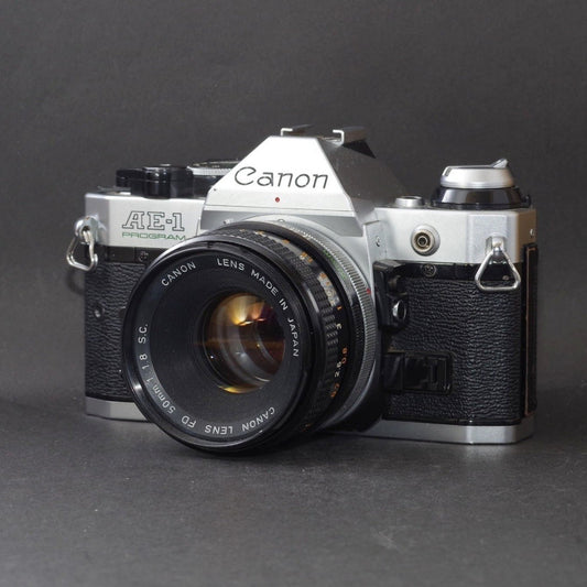Canon AE-1 PROGRAM with FD 50mm f/1.8 S.C. (Silver) - Filem.sg