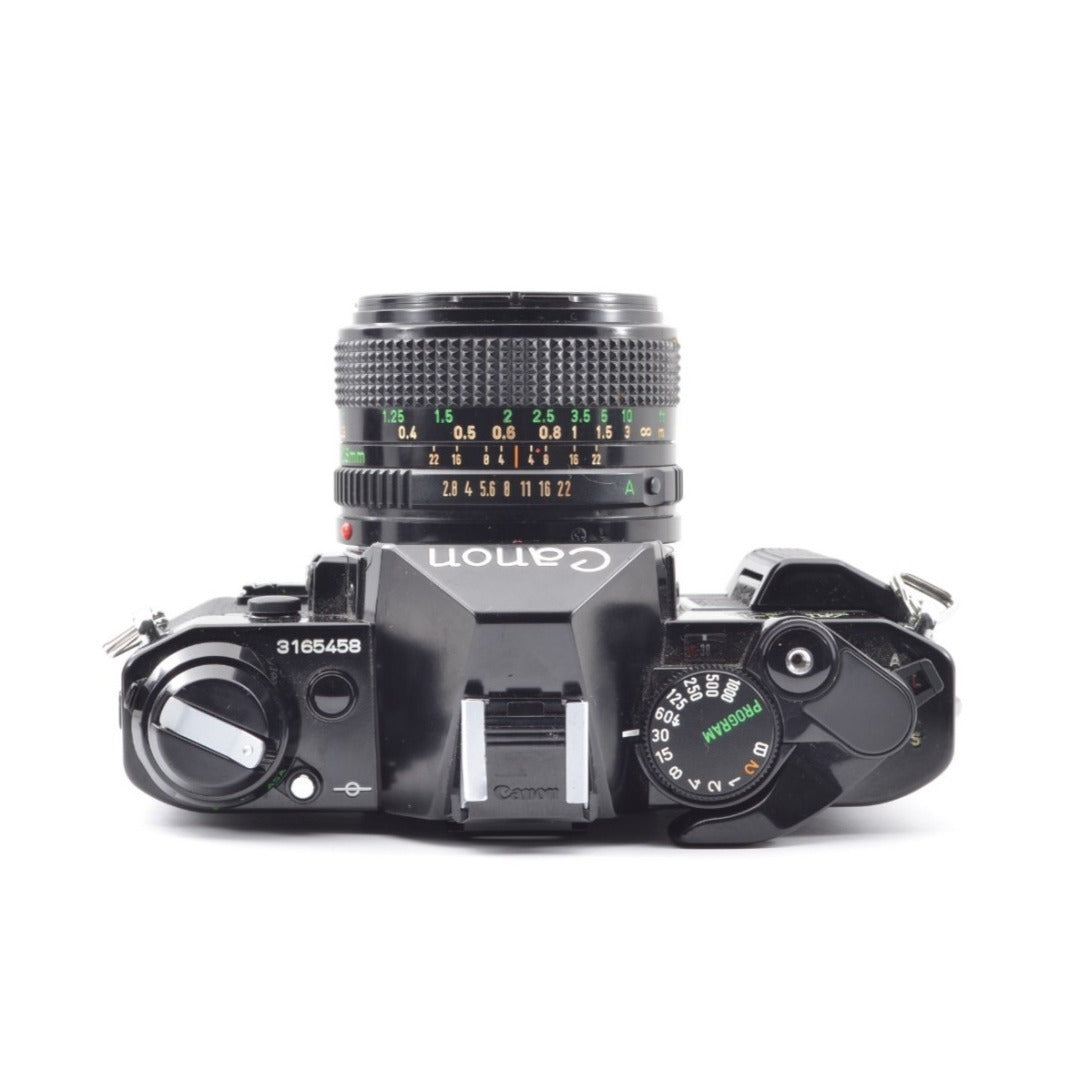 Canon AE-1 Program with FD 28mm f/2.8 (Black) - Filem.sg