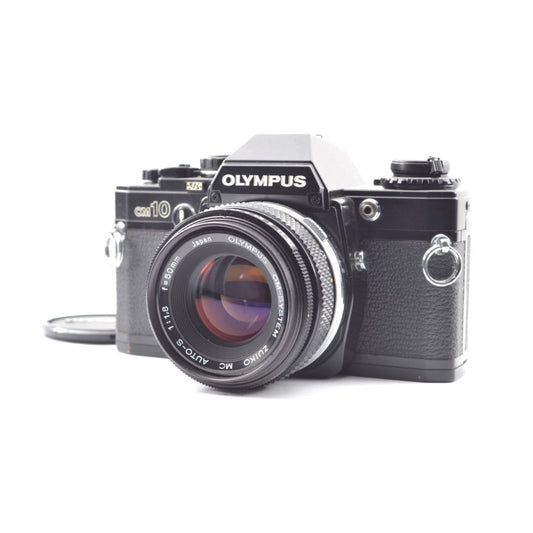 Olympus OM-10 with Zuiko MC 50mm f/1.8 - Filem.sg